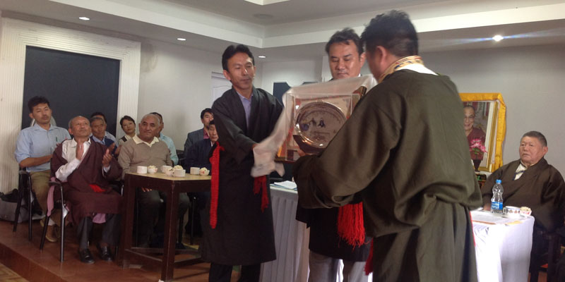 Presenting Yuthog Award to Ven. Troru Tsenam Rinpoche